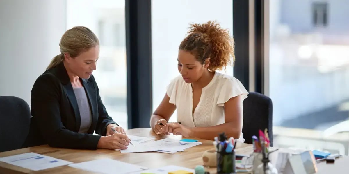People reviewing a contract